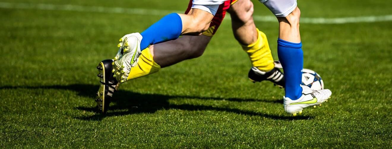 how to stretch synthetic football boots