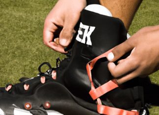 how do i properly fit football cleats with ankle pads and braces